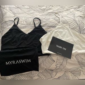 Myra Swim tops, 2, 1 black, 1 white different styles both size medium